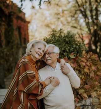 senior-couple-embracing-in-autumn-park-2022-04-19-01-44-34-utc-scaled-punob6b89qgnd82d2khkqbog8ieddt205vulxgfnj6