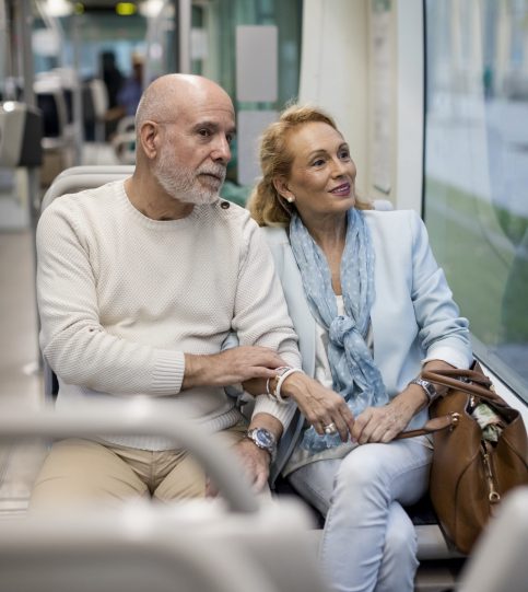 senior-couple-sitting-in-a-tram-2022-03-08-01-26-45-utc-scaled-punob1m38urz228qvrdixa0rforqmp36nnpexp04iq